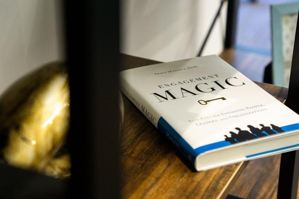 Photo of Engagement Magic book sitting on a shelf