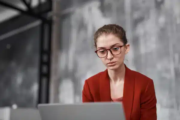 woman sitting at laptop